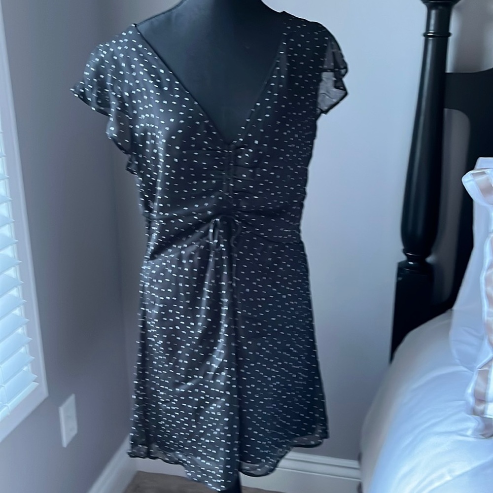 Black little dress size L but runs very small.
